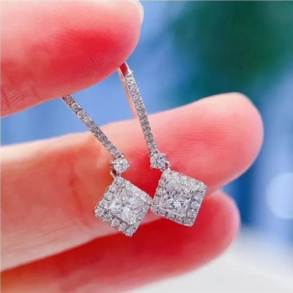The Geometric Dangle Drop Earrings in 925 silver and cubic zirconia